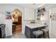 Charming kitchen with white cabinets, a cozy island, and open access to other living spaces at 725 Brown Pl, Decatur, GA 30030