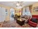 Inviting living room showcasing an arched doorway, ceiling fan, and neutral color palette at 725 Brown Pl, Decatur, GA 30030