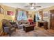 Cozy living room featuring hardwood floors, comfortable seating, and bright, natural light at 725 Brown Pl, Decatur, GA 30030