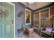 Relaxing covered porch featuring rocking chairs and decorative touches, perfect for enjoying the outdoors at 725 Brown Pl, Decatur, GA 30030