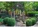 A charming gazebo provides a cozy outdoor seating area surrounded by lush greenery at 1676 Grove Park Way, Decatur, GA 30033