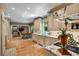 A chef's kitchen featuring custom cabinets, stainless appliances, and sleek marble countertops at 1676 Grove Park Way, Decatur, GA 30033