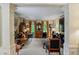 Inviting living room space filled with beautiful and eclectic furnishings and elegant finishes at 1676 Grove Park Way, Decatur, GA 30033