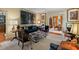 Sophisticated living room with refined furnishings, art and details offers an inviting ambiance at 1676 Grove Park Way, Decatur, GA 30033