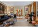 Spacious and bright living room with exquisite decor, large windows and access to the dining room at 1676 Grove Park Way, Decatur, GA 30033