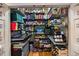 Organized pantry with shelving and storage for food, books, and household goods at 1676 Grove Park Way, Decatur, GA 30033