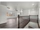 Bright interior featuring hardwood floors, ample windows, and an elegant staircase at 1892 Buford Dam Rd, Buford, GA 30518