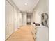 Bright hallway features ample storage and light wood floors throughout the home at 195 14Th St # 1501, Atlanta, GA 30308