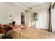 Bright home office features a sleek wooden desk, modern clear chairs, and ample closet space at 195 14Th St # 1501, Atlanta, GA 30309