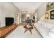 Spacious living room flowing into dining area, brightened by natural light at 195 14Th St # 1501, Atlanta, GA 30309