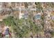 Aerial view of the home showcasing the surrounding neighborhood and lush, mature landscaping at 195 Willow Way, Stockbridge, GA 30281