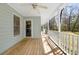 Enjoy the outdoors on this back porch overlooking the trees and manicured backyard at 195 Willow Way, Stockbridge, GA 30281