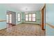Inviting dining room with large windows, chandelier lighting, and views to the kitchen at 195 Willow Way, Stockbridge, GA 30281
