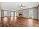 Inviting living room showcasing a fireplace, hardwood floors, and plenty of natural light at 195 Willow Way, Stockbridge, GA 30281