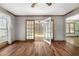 Living room featuring hardwood floors, a fireplace, and a door leading to the back porch at 195 Willow Way, Stockbridge, GA 30281