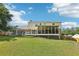 Wide shot of the house and backyard with a covered porch at 3734 Fox Hills Se Dr, Marietta, GA 30067