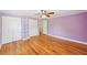 Bedroom featuring hardwood floors and double closets at 3734 Fox Hills Se Dr, Marietta, GA 30067