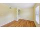 Bedroom with hardwood floors and closet with shelves at 3734 Fox Hills Se Dr, Marietta, GA 30067