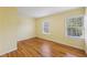 Bedroom with hardwood floors and windows at 3734 Fox Hills Se Dr, Marietta, GA 30067