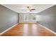 Spacious bedroom with hardwood floors, built-in shelving and ample natural light at 3734 Fox Hills Se Dr, Marietta, GA 30067