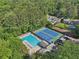 Overhead shot featuring a large swimming pool and tennis courts, highlighting community recreational amenities at 3734 Fox Hills Se Dr, Marietta, GA 30067
