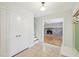 Inviting foyer featuring tile floors, a coat closet, and an entrance to the living room at 3734 Fox Hills Se Dr, Marietta, GA 30067