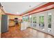 Bright kitchen featuring stainless appliances, an island and doors to the back porch at 3734 Fox Hills Se Dr, Marietta, GA 30067