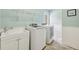 Laundry room with modern washer and dryer, offering convenience at 3734 Fox Hills Se Dr, Marietta, GA 30067