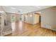 Spacious living room with a charming brick fireplace and natural light at 3734 Fox Hills Se Dr, Marietta, GA 30067