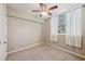Bedroom with carpet flooring, ceiling fan and curtains at 1257 Park Pass Way, Suwanee, GA 30024