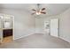 This bedroom has two doorways leading to the bathroom and another room at 1257 Park Pass Way, Suwanee, GA 30024