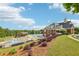 Enjoy the community pool with sundeck, a covered patio with seating and clubhouse at 1257 Park Pass Way, Suwanee, GA 30024