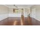 Open-concept living area featuring hardwood floors, modern trimwork, and natural light at 1257 Park Pass Way, Suwanee, GA 30024