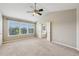 Bright main bedroom with vaulted ceilings, ensuite access, and many windows at 1257 Park Pass Way, Suwanee, GA 30024