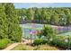 Well-maintained pickleball courts provide a fun and active community amenity at 1257 Park Pass Way, Suwanee, GA 30024