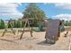 Community playground featuring swings, a climbing wall, slide, and bench seating at 1257 Park Pass Way, Suwanee, GA 30024
