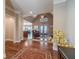 Bright and open foyer with hardwood floors leading to the living spaces at 255 Nicklaus Cir, Social Circle, GA 30025