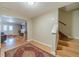 Inviting living room with wood-look floors, a walkout, and open floor plan at 255 Nicklaus Cir, Social Circle, GA 30025