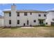 Spacious backyard with a back patio and well-maintained lawn at 3740 Arminto Dr, Ellenwood, GA 30294