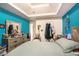 Stylish bedroom with tray ceiling and a mix of blue and white tones at 3740 Arminto Dr, Ellenwood, GA 30294