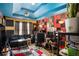 Eclectic bedroom featuring colorful accents, soundproofing foam, and unique decor for a creative space at 3740 Arminto Dr, Ellenwood, GA 30294