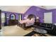 Bright primary bedroom showcasing a vaulted ceiling, complemented by dark furniture and accents for a serene retreat at 3740 Arminto Dr, Ellenwood, GA 30294