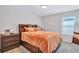 Comfortable bedroom features a cozy bed with built-in storage and a soft color scheme at 4658 Electric Sw Ave, Mableton, GA 30126