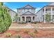Charming home featuring a stone-accented front porch, well-maintained landscaping, and a welcoming entryway at 4658 Electric Sw Ave, Mableton, GA 30126