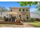 A spacious backyard with a wooden deck, ideal for outdoor gatherings and leisure activities at 6155 Falls Landing Dr, Cumming, GA 30040