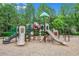 A large playground area with slides, swings, and climbing structures, perfect for outdoor fun and activities at 6155 Falls Landing Dr, Cumming, GA 30040