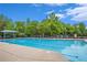 A sparkling swimming pool with ample lounging space, providing a perfect spot for summer relaxation and recreation at 6155 Falls Landing Dr, Cumming, GA 30040