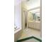Bright bathroom featuring a soaking tub, a large mirror and vanity with ample storage space at 1187 Ward Creek Sw Dr, Marietta, GA 30064