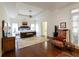 Bright and airy bedroom with hardwood floors, tray ceiling, ceiling fan and large windows at 1187 Ward Creek Sw Dr, Marietta, GA 30064