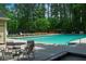 Community pool with lounge chairs offering a relaxing outdoor space at 1187 Ward Creek Sw Dr, Marietta, GA 30064